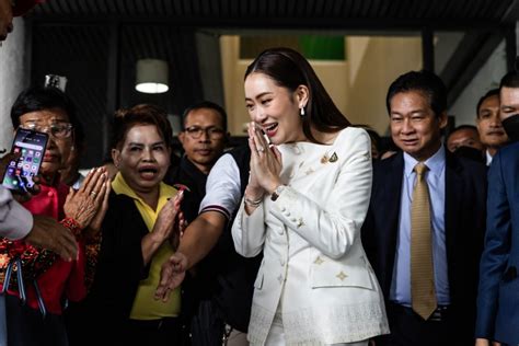 Thailand’s Democrat Joins Ruling Thaksin.